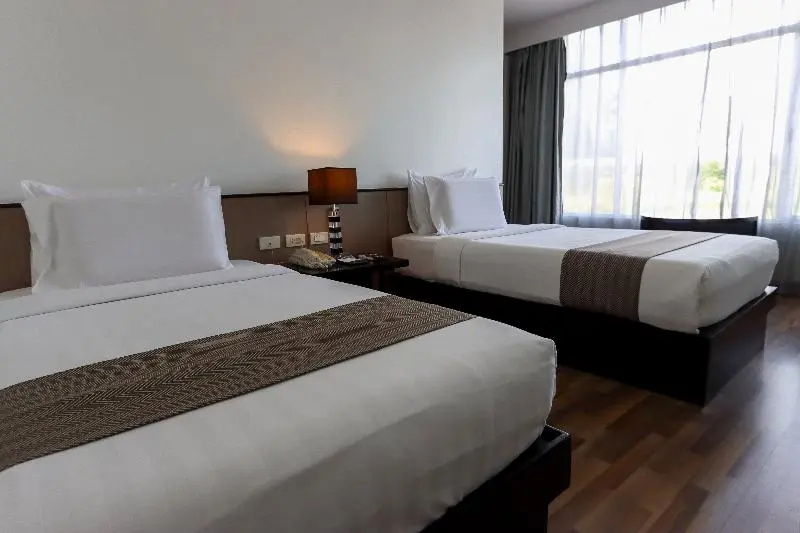 Paseo Premiere Hotel - Chambres