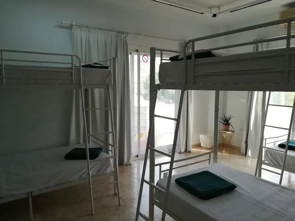 Bed in Dorm (female dorm) with balcony