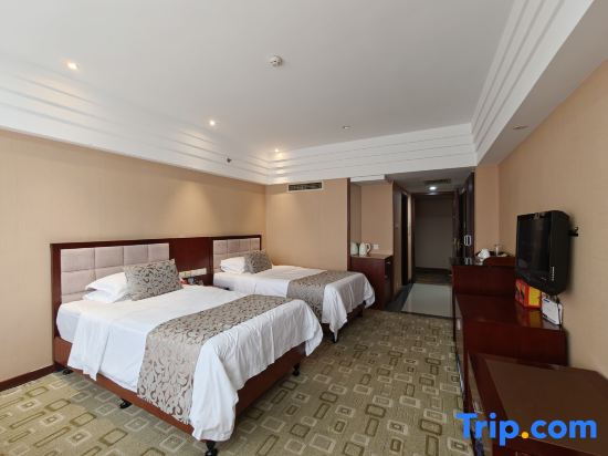 Xinli Hotel - Chambres