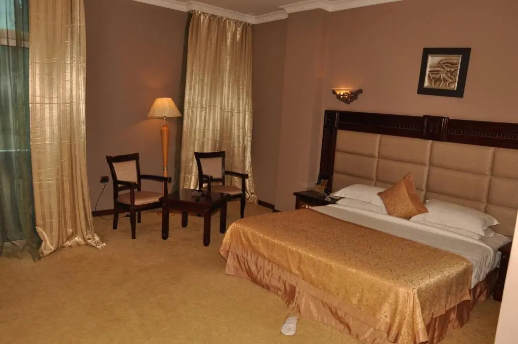 Friendship International Hotel - Chambres