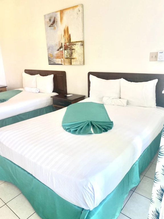 Premium Quadruple room with balcony and with pool view