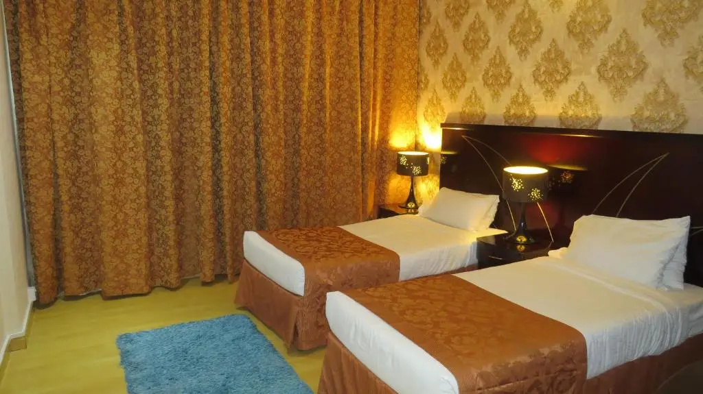 Al Jawhara Hotel Apartments - Chambres