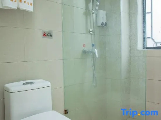 Huajun Hotel - Chambres