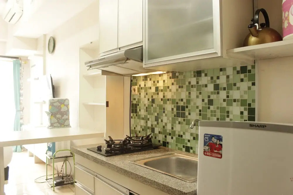 Homey Studio Room at Tamansari Panoramic Apartment