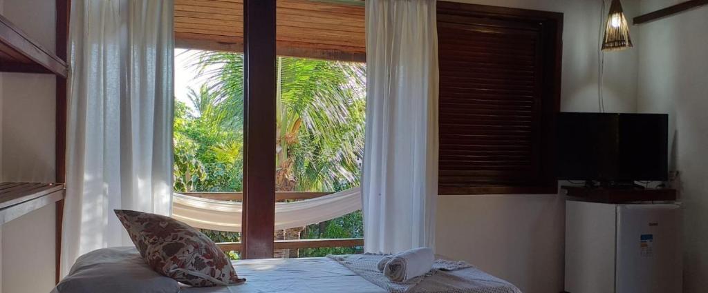 Двухместный люкс двуспальная кровать в Pousada Cabana