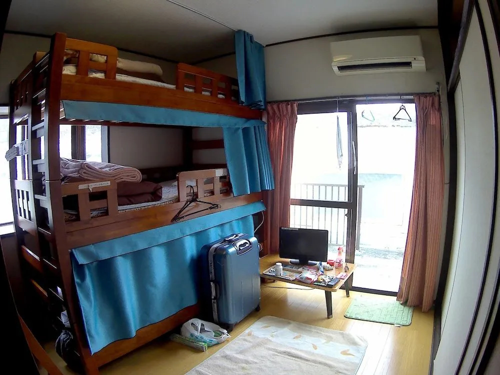 GUEST HOUSE IN AMAMI RYOUFUU - Hostel - фото 2