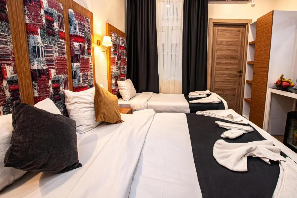 La Pazza Suites Hotel - Chambres