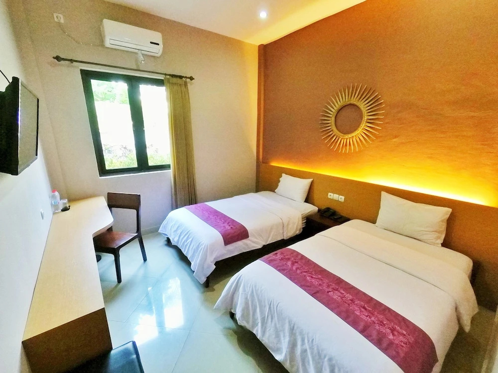 Hotel Transit Pasuruan - Tap to explore photos