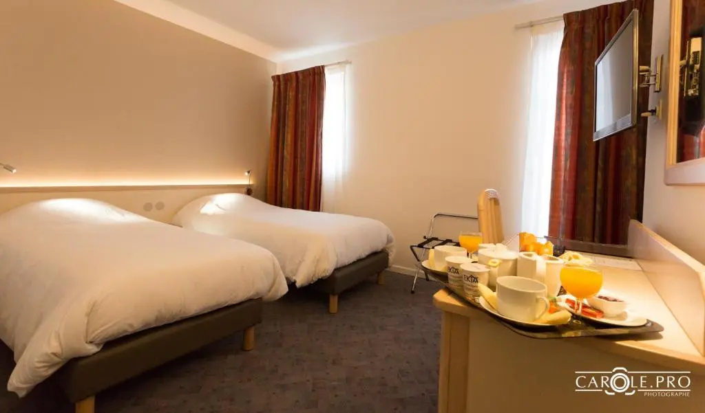 Hotel De La Paix - Chambres