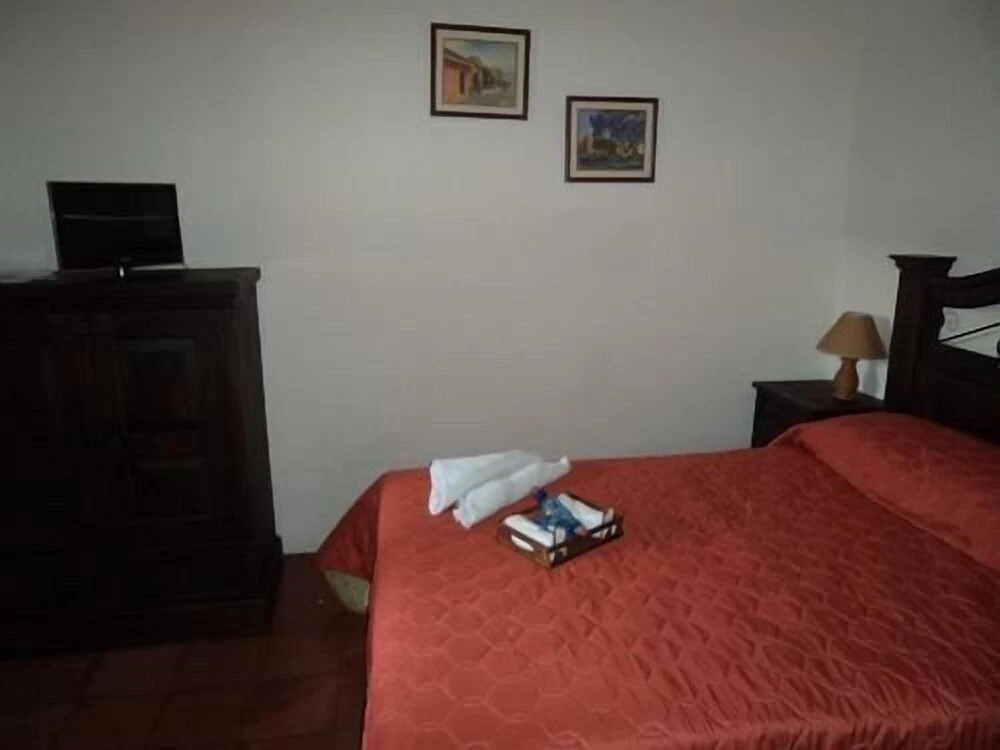 Chez Juanca Hotel Cafe - Chambres