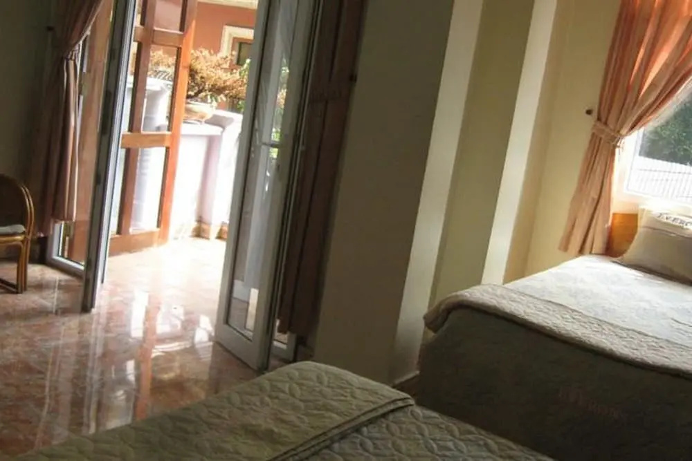 Sunny C Hotel - Chambres