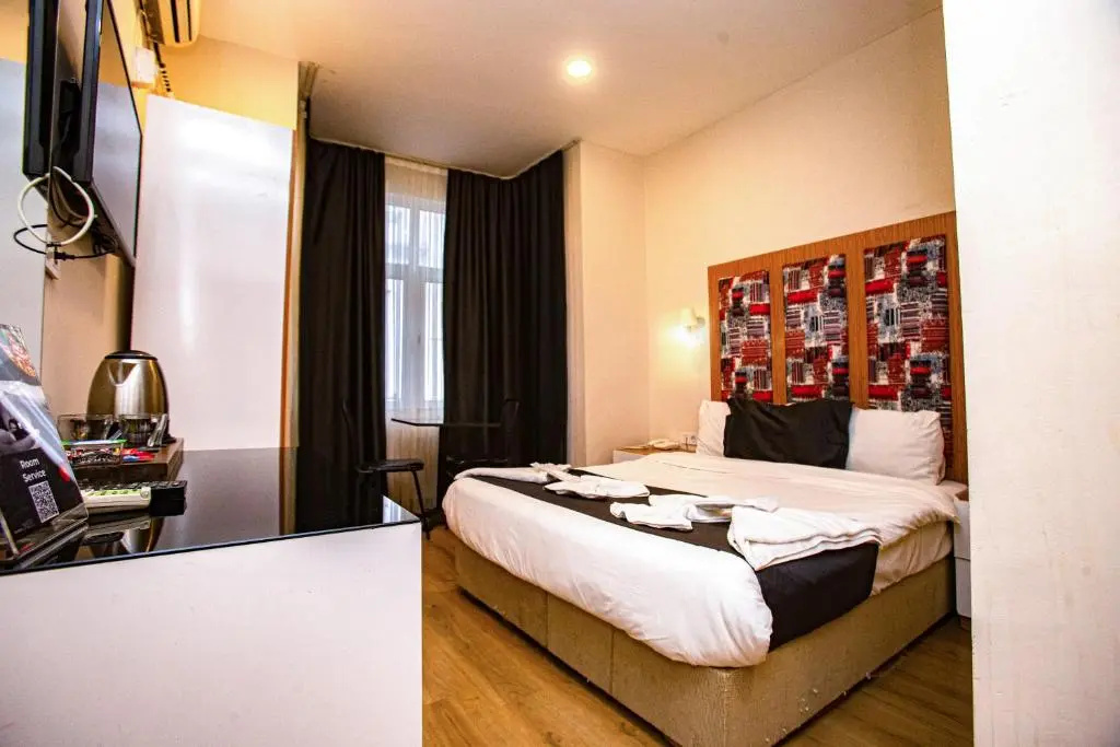 La Pazza Suites Hotel - Chambres