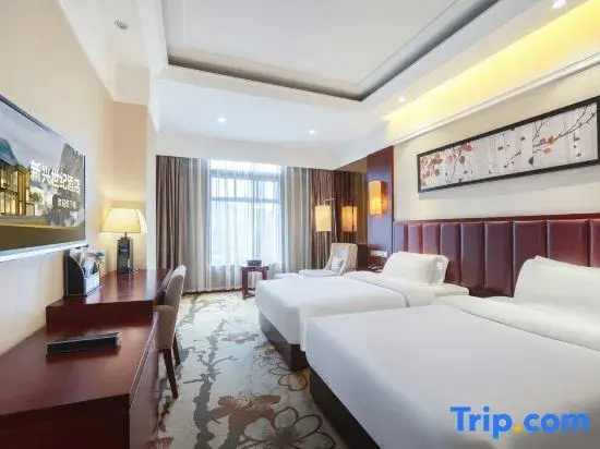 Xinxing Century Hotel - Chambres
