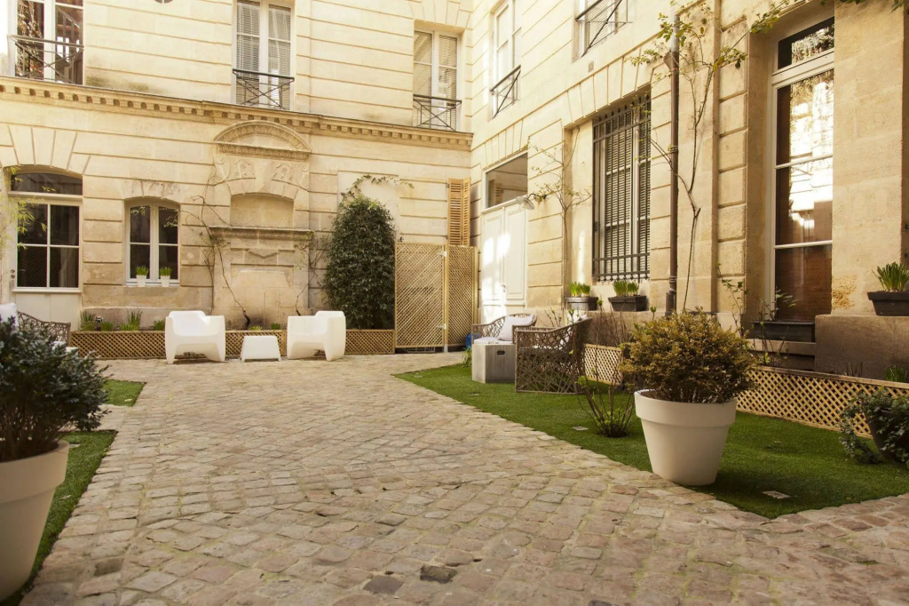 Voir la photo 1 — L'Hôtel Particulier
