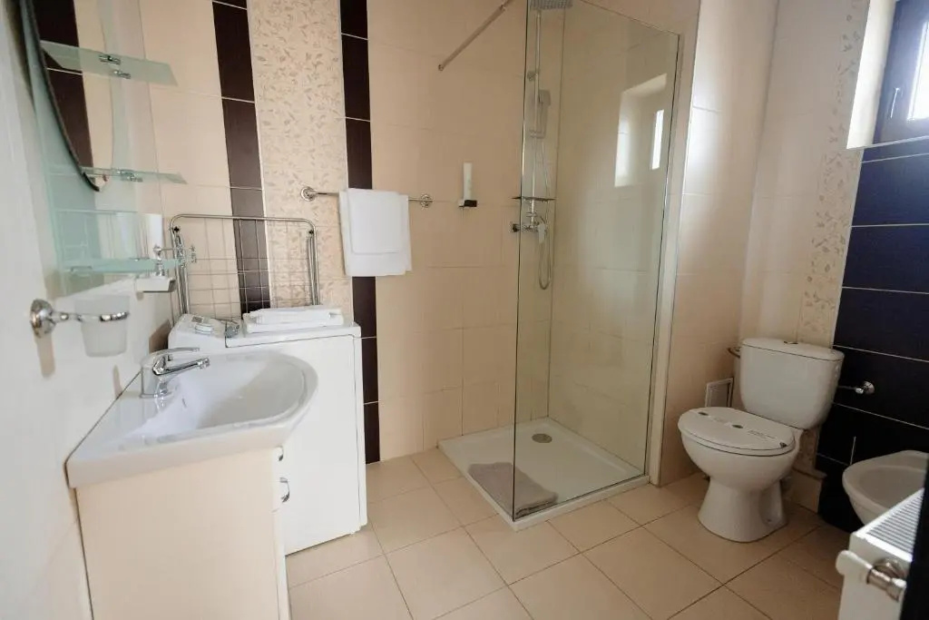 Aparthotel Punct pe i - Chambres