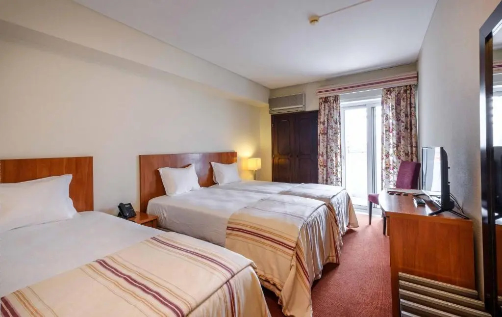 Católica Hotel - Chambres