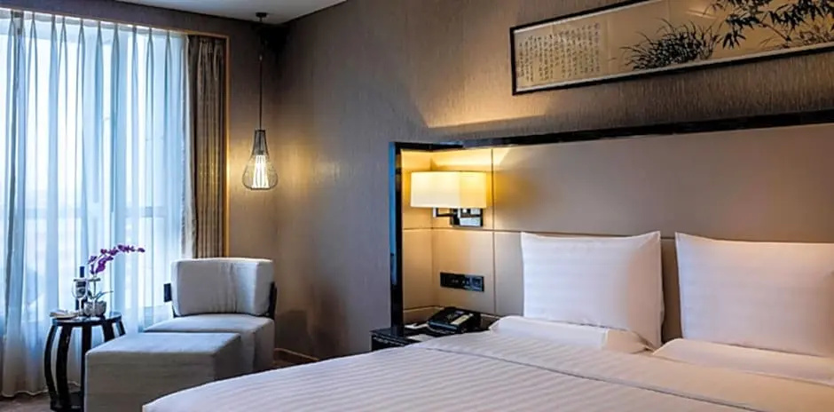 Pullman Qingdao Ziyue - Chambres
