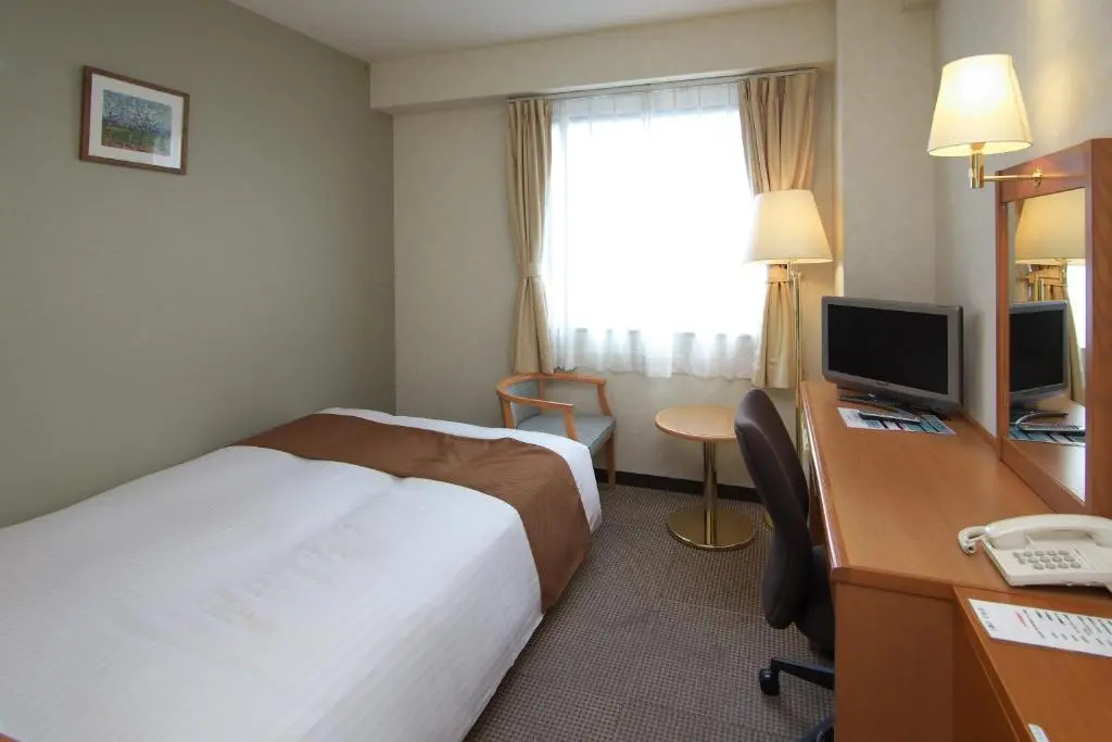 Toyooka Sky Hotel - Chambres