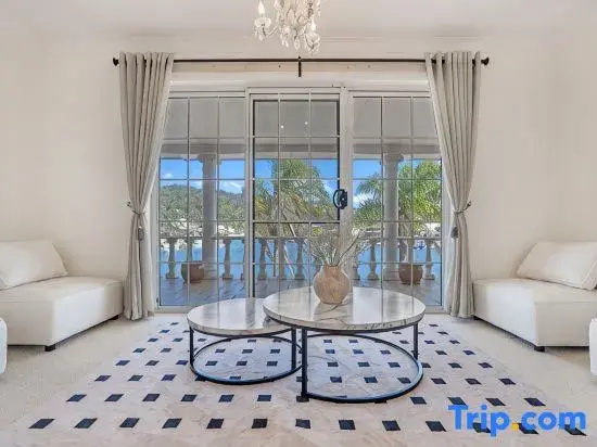 Stunning 4BR Holiday Home with Water Views & Pool