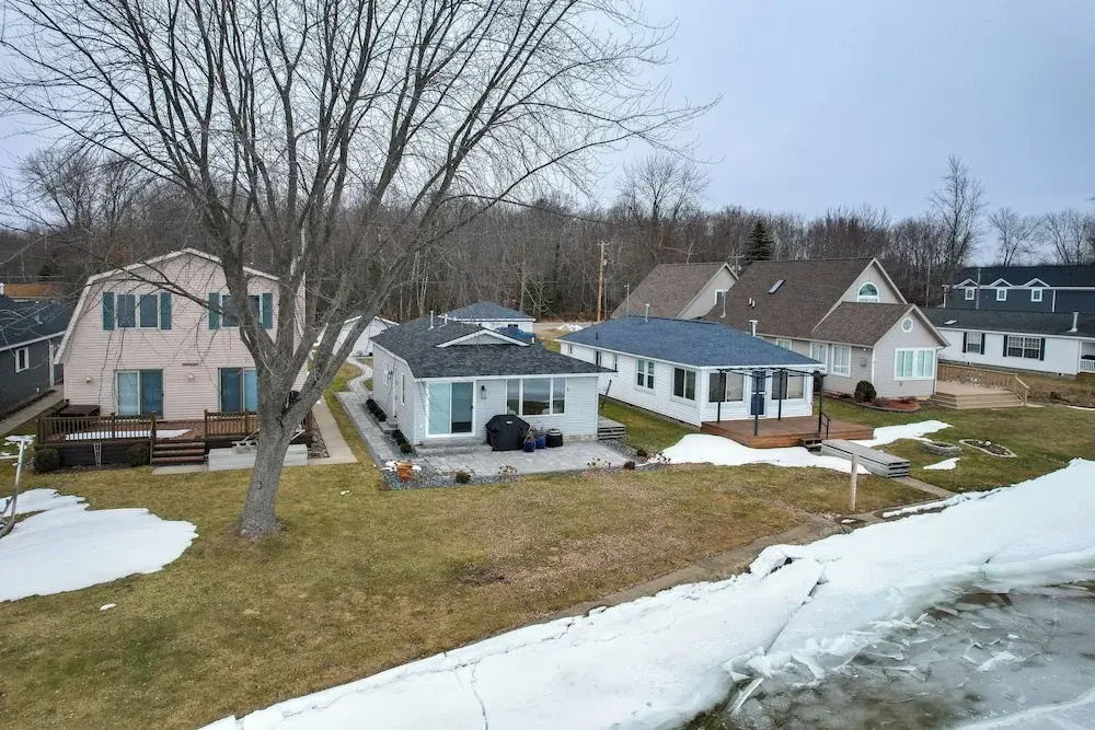 Bright Houghton Lake Home w/ Boat Dock + Fire Pit