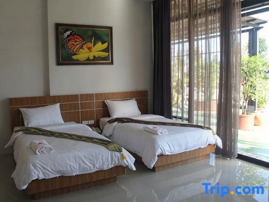 Tawan Anda Garden Hotel - Chambres