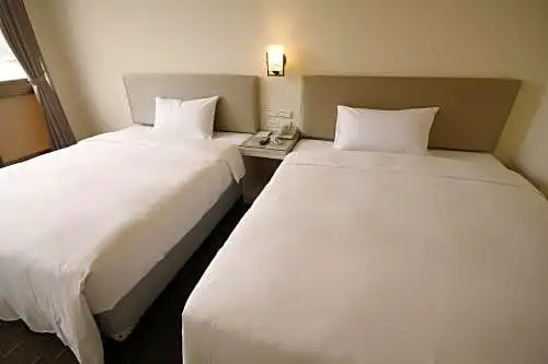 Qin Hai Hotel - Chambres