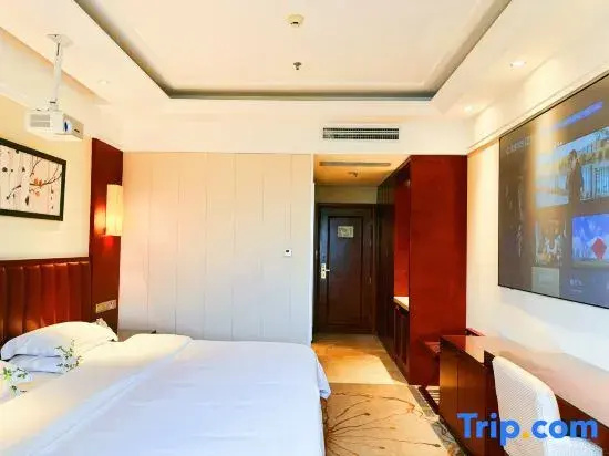 Xinxing Century Hotel - Chambres