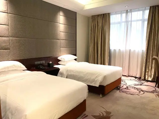 Yinhao Holiday Hotel - Chambres