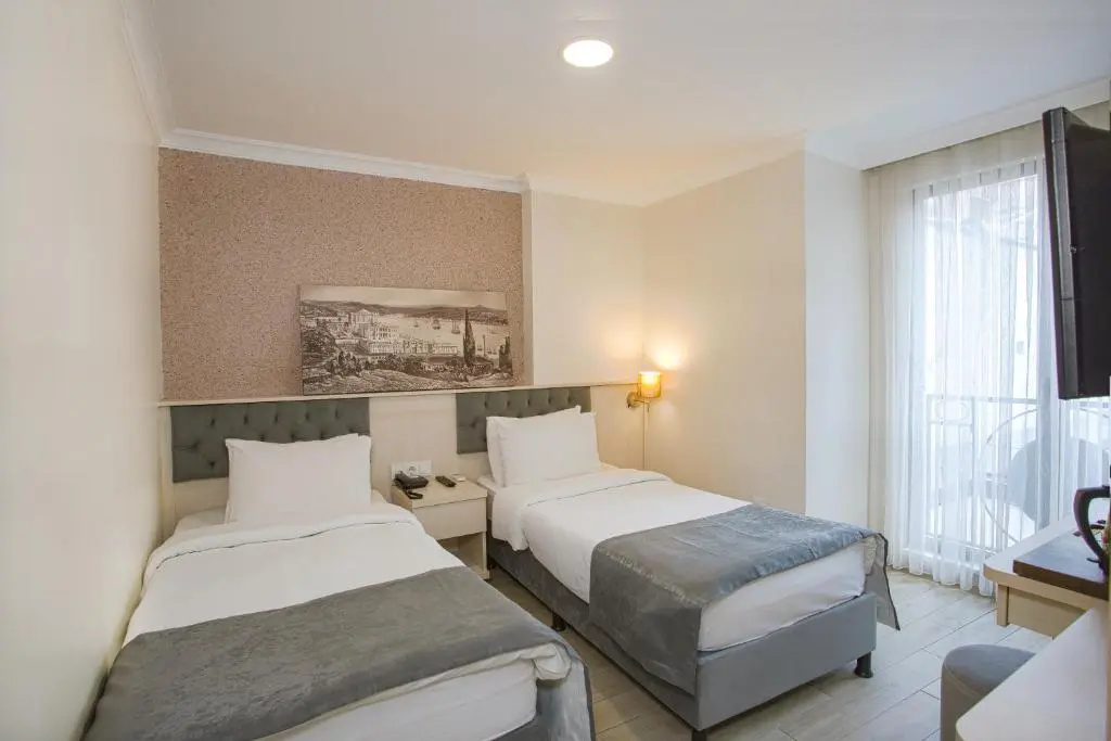 Sim Hotel - Chambres