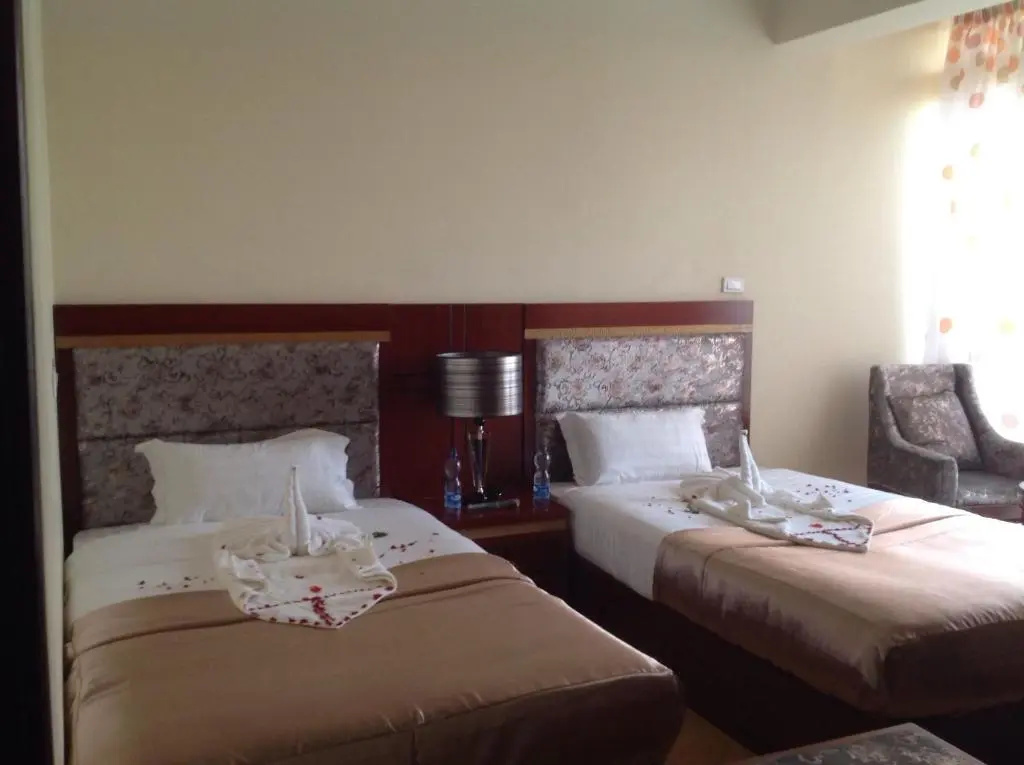 Palm Palace Hotel - Chambres
