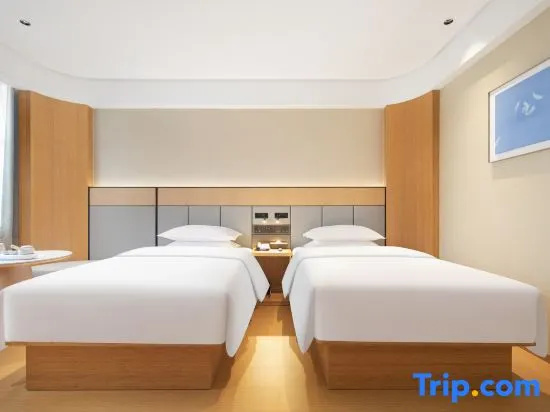 Qingxin Hotel - Chambres