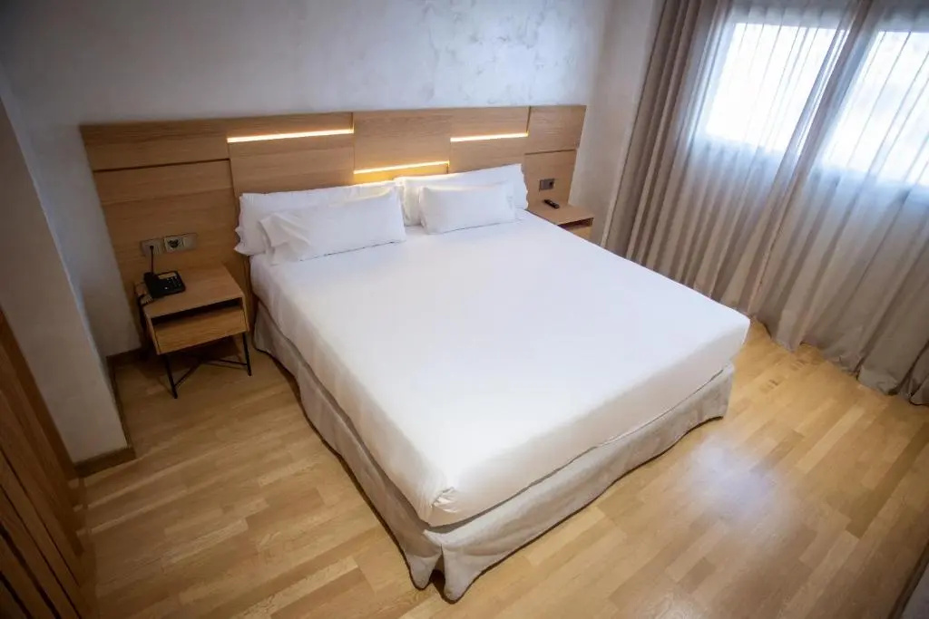 Hotel Sercotel Gran Fama - Chambres