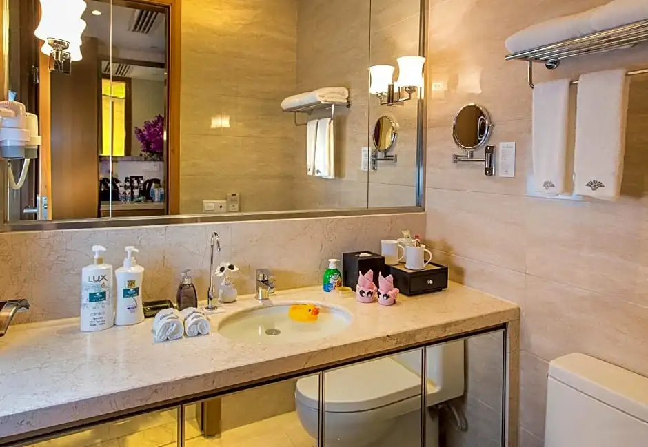 Huachen International Hotel - Chambres