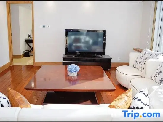 Jingguang Center Apartment Hotel - Chambres