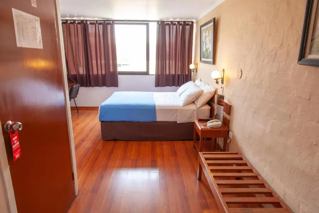 Hotel Holiday Suites - Chambres