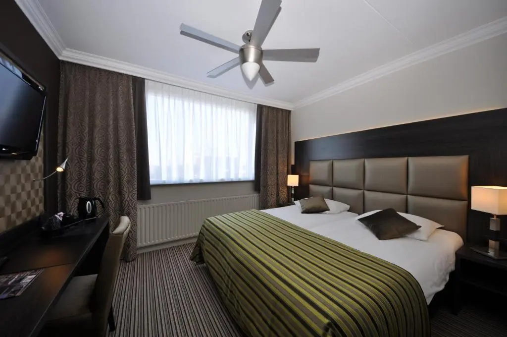 Grandcafé Hotel Terminus - Chambres