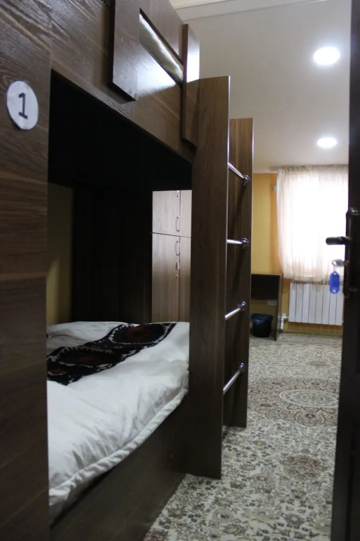 Кровать в общем номере в National Hostel