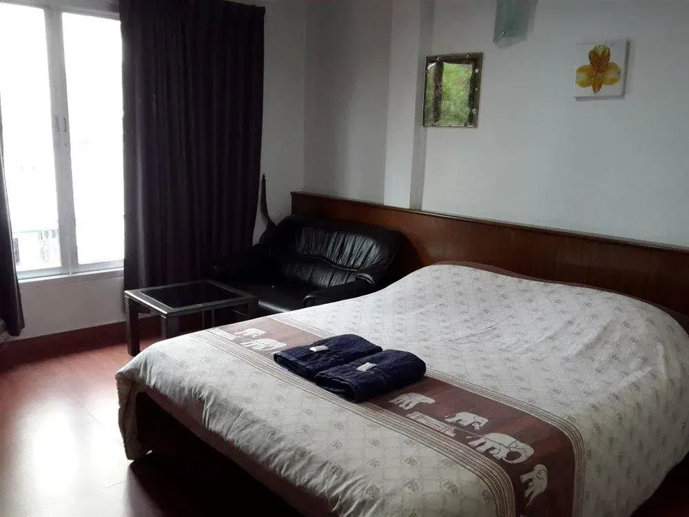 Отель White Orchid Inn в Бангкоке