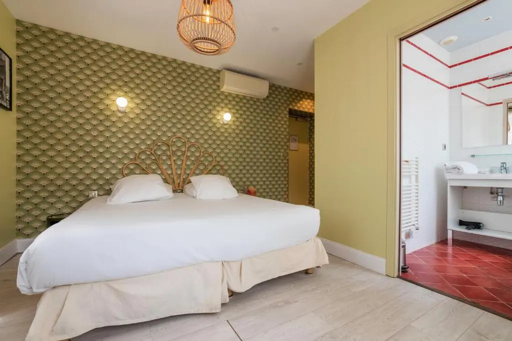 Hôtel Cosmopolitain - Chambres