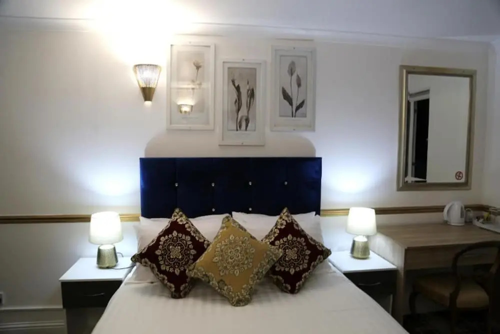 OYO 4 Sisters Inn - Chambres