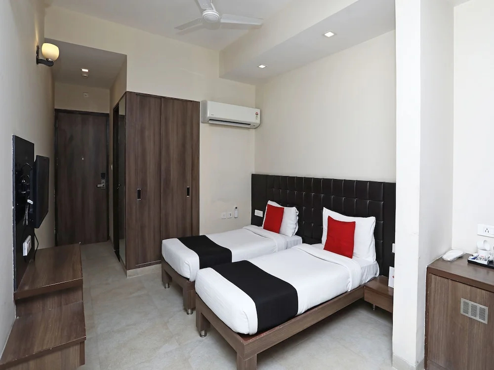 Capital O 3831 Jade Inn - Chambres