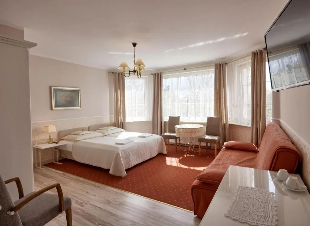 Standard Quadruple room with garden view