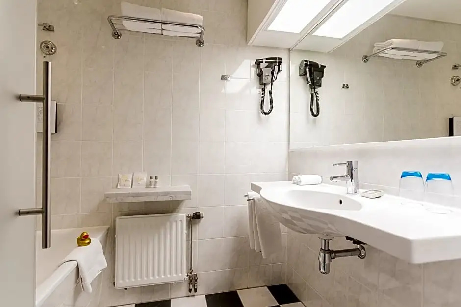 Golden Tulip Hotel Central - Chambres