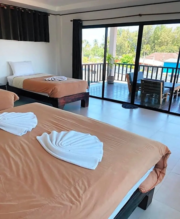 The Reef Hotel & Studios - Chambres