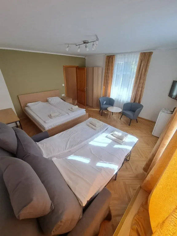 Deluxe Quadruple room with balcony