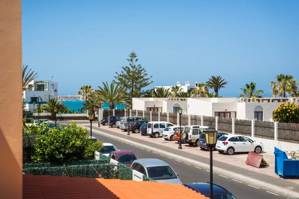 Family Apartment Delfines in Heart of Corralejo- Only 1 min to Sea, with Pool & Free Wifi by Holidays Home