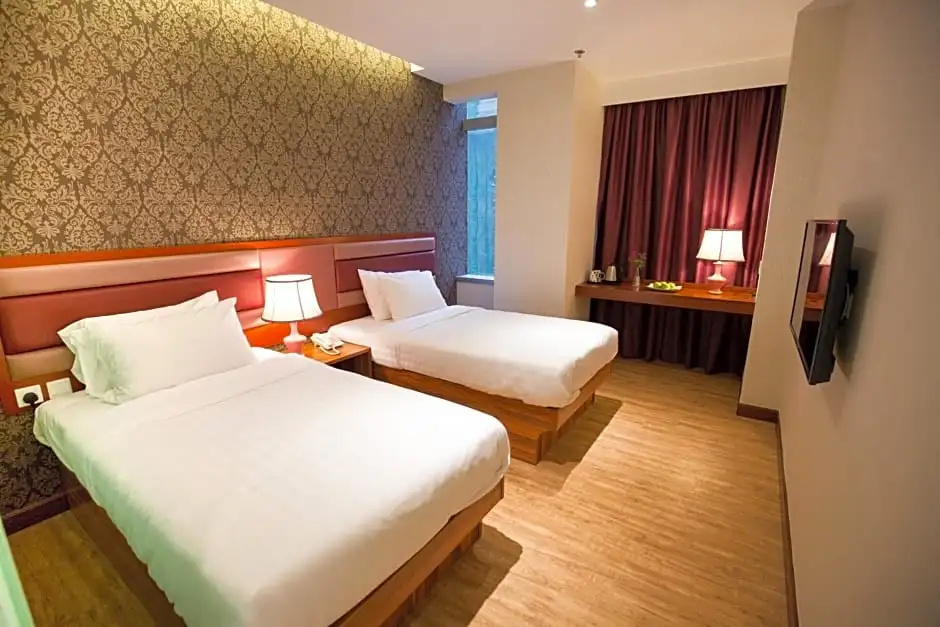 Metro Winner Hotel - Chambres