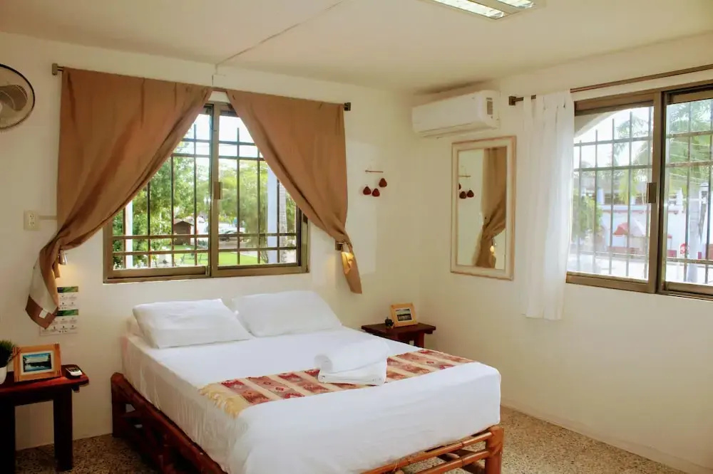 Hostal & Suites Pata de Perro - Chambres
