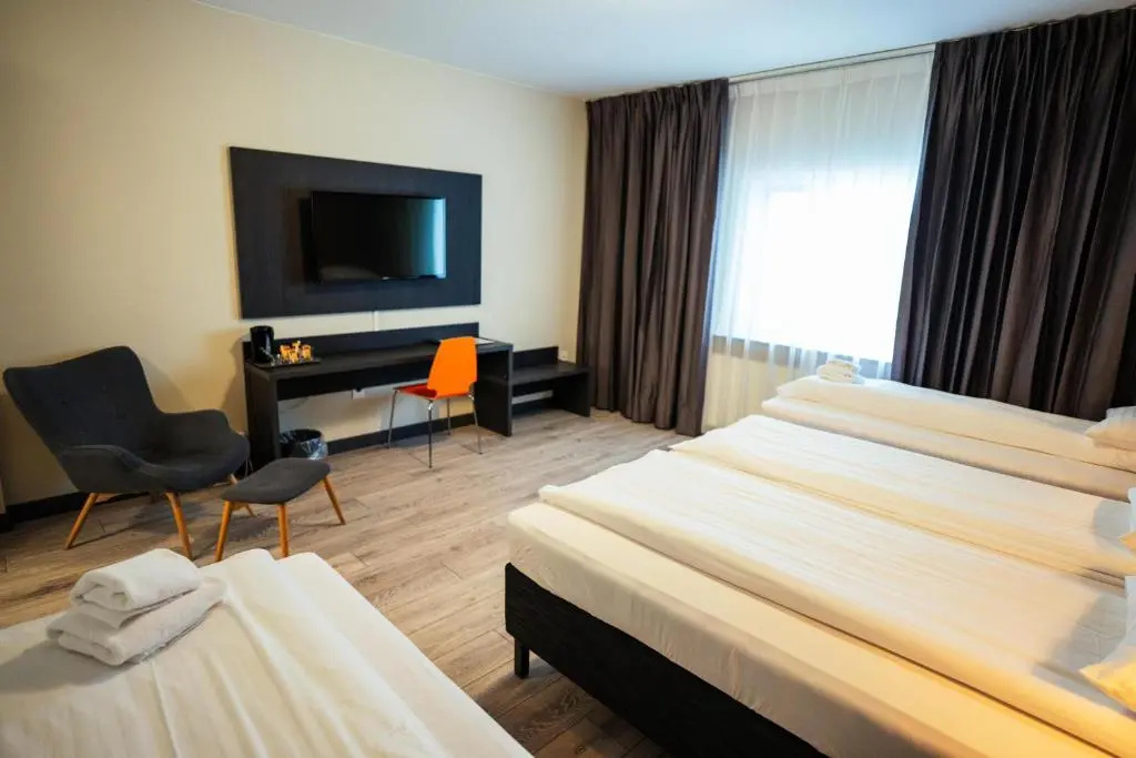 Konvin Hotel - Chambres
