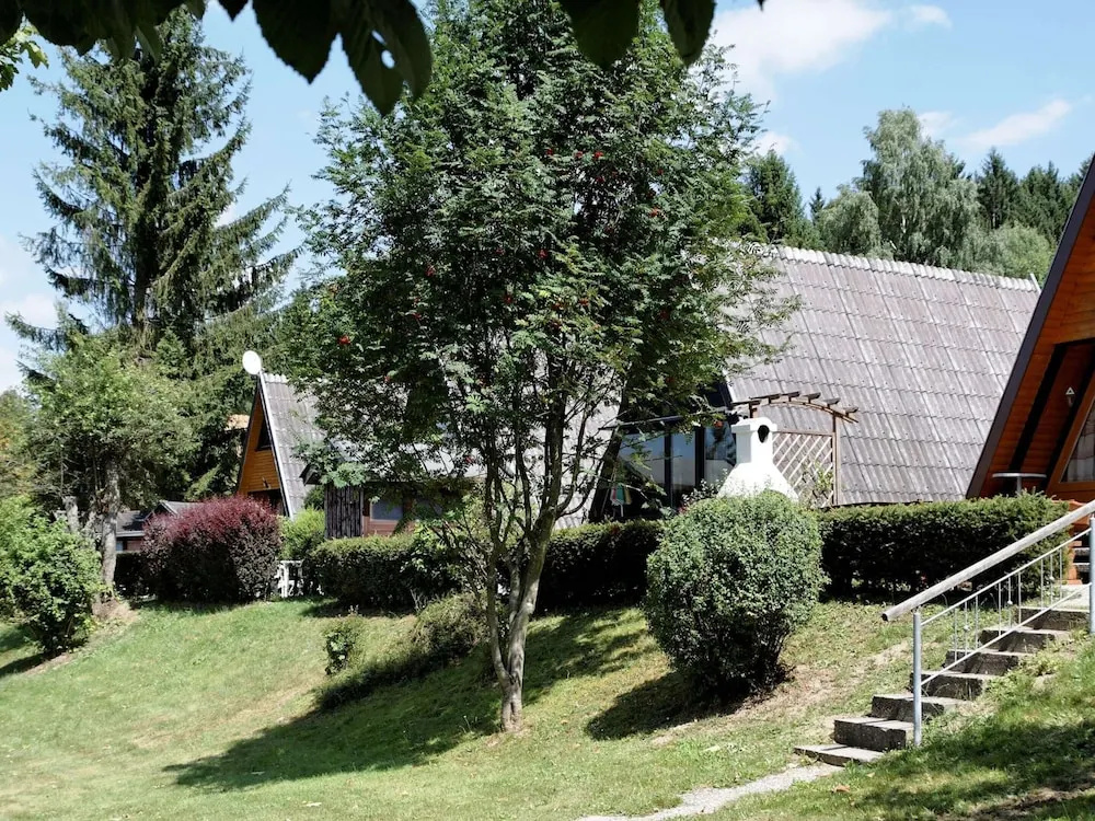 Wooden Chalet With Terrace Near a Swimming Lake
